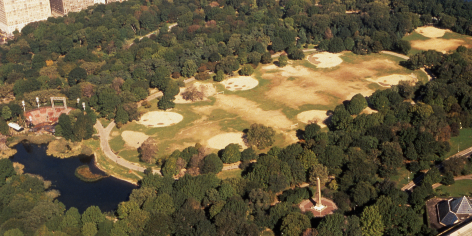 An archival aerial photo of the Great Lawn showing more dust than grass.